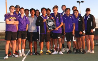 Lemoore's tennis team with the runner-up trophy Wednesday afternoon.